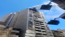 تصاعد الدخان من عقار مجاور لمستشفى دولي بمدينة نصر