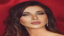 نانسي عجرم تخطف الأنظار بإطلالتين متناقضتين بين الأبيض الناعم والأسود الراقي