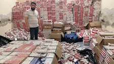 تموين الإسكندرية تضبط 800 ألف لتر وقود و65 ألف علبة سجائر مهربة - صور