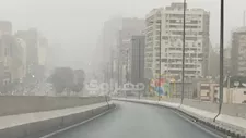 بالصور.. عاصفة ترابية تضرب القاهرة والجيزة 