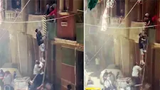 لحظة إنقاذ أهالي "أرض الحافي" للأطفال من داخل حريق حضانة بشبرا الخيمة -فيديو وصور