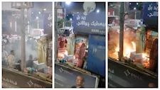 صاحب كشك في أسيوط يُشعل النار به خلال حملة إزالة.. والمحافظة: مخالف وصادر له إزالة- صور