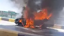   النيران التهمته بالكامل.. تفحم تاكسي على كوبري النيل بالمنيا -صور 