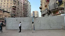 إجراءات عاجلة لمحافظ الجيزة بعد ميل عقارين بالهرم - صور