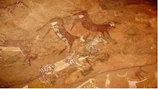 "كائنات بلا رؤوس وأيادٍ غريبة".. ما سر رسومات "كهف الوحوش" بالوادي الجديد؟ (صور)