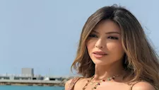 ميرنا جميل تتألق بإطلالة صيفية جريئة بالقرب من البحر