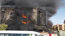 بالفيديو لحظة انتشال 3 جثامين من حريق عقار حدائق الأهرام