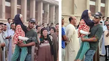 يحملها بين ذراعيه ويبكي.. لحظة خروج أب بطفلته الناجية من حادث الإسماعيلية: "لسه عايشة" -صور