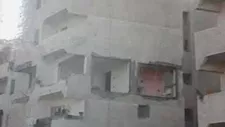 "شقة العفاريت" في بورسعيد.. حكاية حائط اختفى فجأة وعمارة تحولت إلى مزار -صور