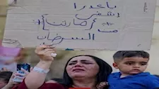 لافتة ودموع ودعاء.. قصة الطفل "مارتن" المصاب بسرطان نادر داخل دير درنكة - صور