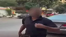 "فيديو الكلب والحجر".. الداخلية تفحص فيديو مشادة سيدة وشاب: "مصورتيش وهو بياكلني؟"