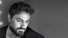 تامر حسني عن كليب "عايزك توعديني": "مشاعر صادقة من أب لبنته" - فيديو