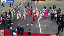 بالصور.. عروض شعبية وأطفال بالأعلام في استقبال الرئيس الصيني بمطار القاهرة