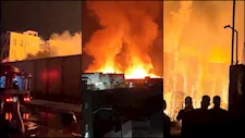 صور ترصد جهود الحماية المدنية في السيطرة على حريق مصنع كرتون خلف سوق العبور