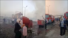 انتداب المعمل الجنائي لمعاينة حريق مصنع كرتون العبور.. والسيطرة الكاملة على النيران - صور