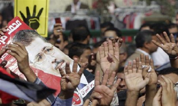 شلل مروري في شارع الهرم بسبب مسيرة لأنصار مرسي