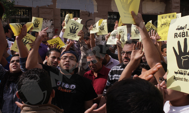 أنصار مرسي يدعون للتجمع بالطالبية بعد فض مسيرة الج
