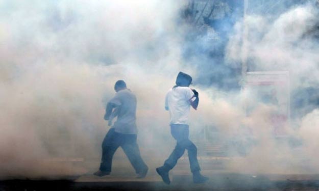 قوات الأمن تفرق مسيرة أنصار مرسي بالهرم بقنابل الغ