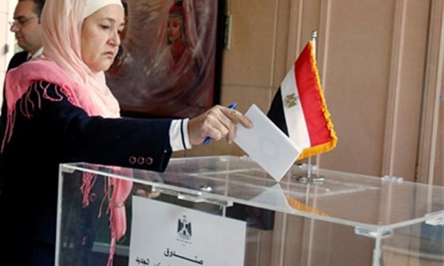 مصريون في السعودية: صوتنا بـ''نعم'' للدستور رفضاً 