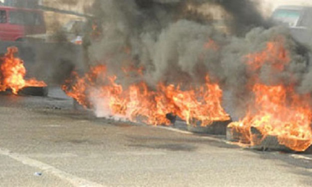 أنصار الإخوان يغلقون شارع الهرم ويشعلون النيران وس