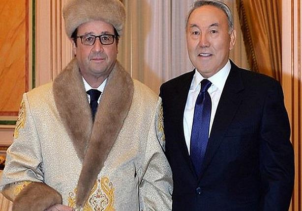معطف أولاند وقبعته يثيران سخرية الفرنسيين