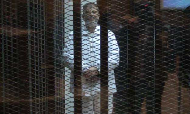 بدء محاكمة مرسي في قضية ''اقتحام السجون''.. و''الع