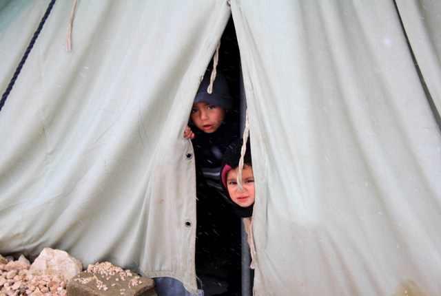 بعض اللاجئين السوريين بالبقاع اللبناني