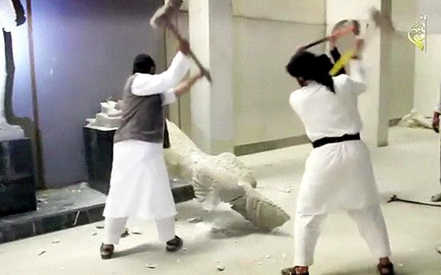 فيديو داعش لتكسير القطع الآثرية في العراق مزيف