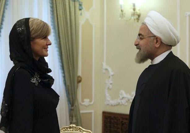 الرئيس الإيراني حسن روحاني ووزيرة الخارجية جولي بي