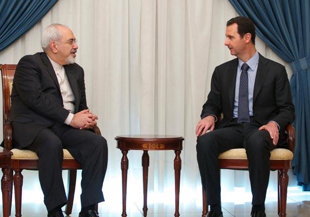 الرئيس السوري بشار الاسد ومحمد جواد ظريف وزير الخا