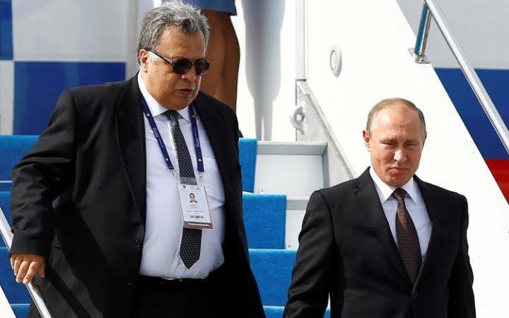 سفير روسيا في أنقرة رفقة بوتين