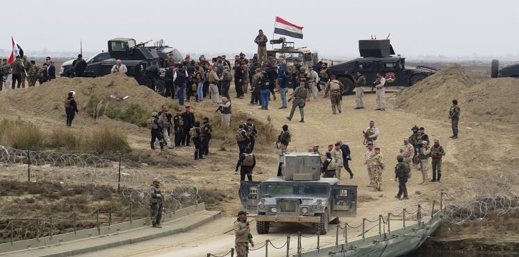 الجيش العراقي يحرر قاعدة القيارة الجوية 