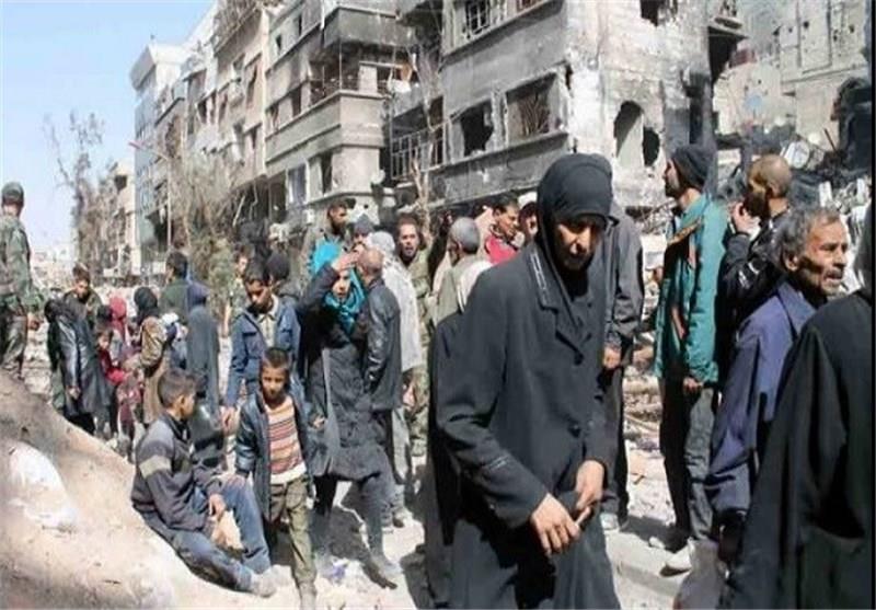 خروج 100 مسلح من حي الوعر في حمص