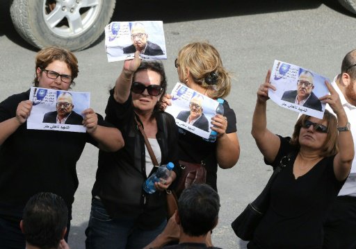 نساء يتظاهرن في الفحيص استنكارا لاغتيال حتر
