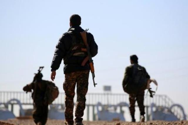 مقاتلون من التحالف الكردي-العربي المعروف بقوات سور