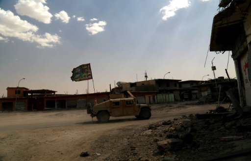 القوات العراقية تقوم بدورية في غرب الموصل في 13 تم