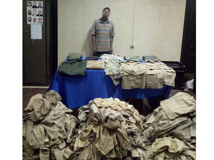 ضبط ملابس عسكرية داخل مخزن غير مرخص في الجمالية