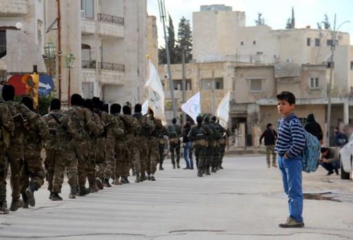 مسلحو جيش الفتح في إدلب السورية - (أ ف ب)