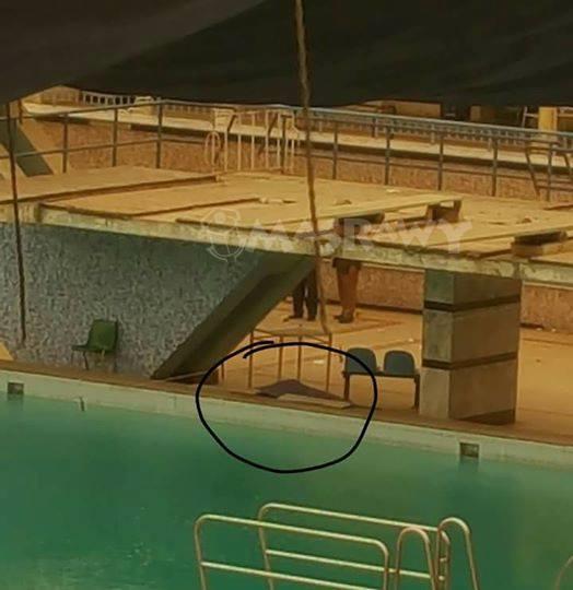 جثة الطالب محمد بدر بعد إخراجها من حمام السباحة با