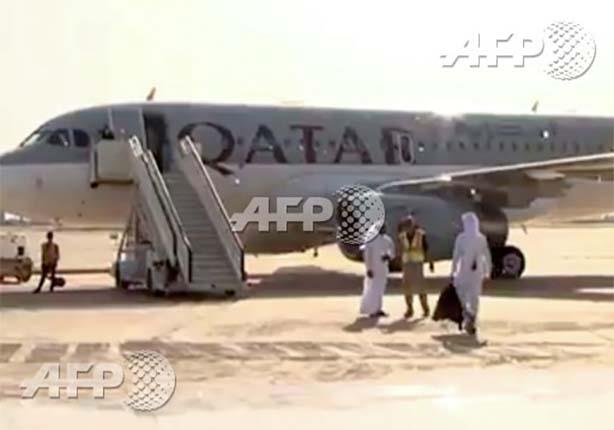 صورة للطائرة القطرية المحملة بالأموال فى مطار بغدا