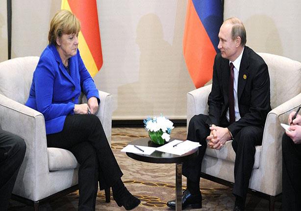 الرئيس الروسي والمستشارة الألمانية