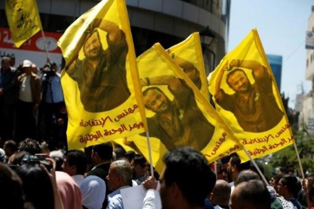 صور للقيادي في حركة فتح مروان البرغوثي خلال تظاهرة