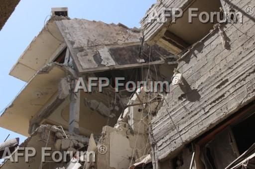 آثار القصف في غوطة دمشق  (أ ف ب)
