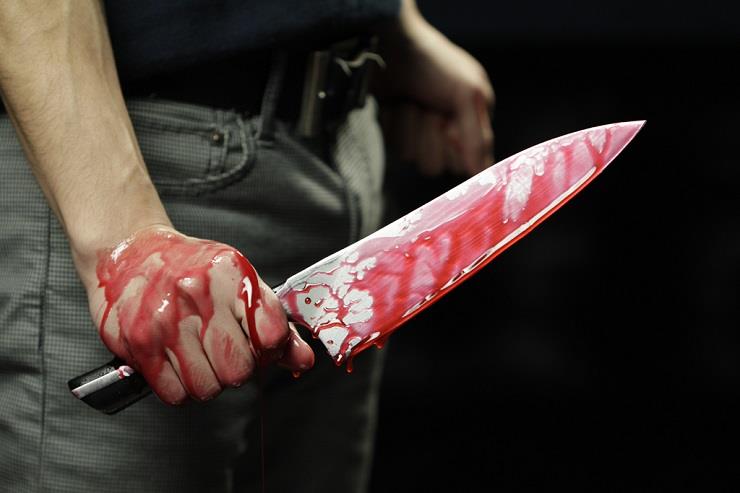تعبيرية عن القتل باستخدام سكين                    