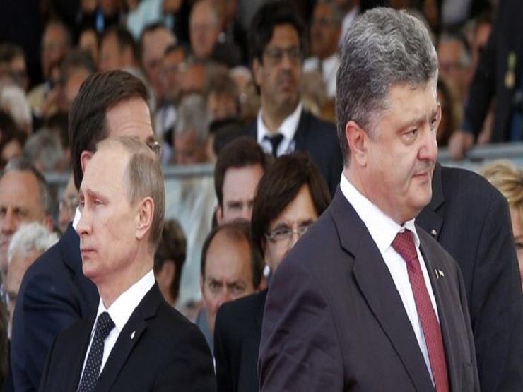 بوتين ونظيره الأوكراني بيترو بورشينكو