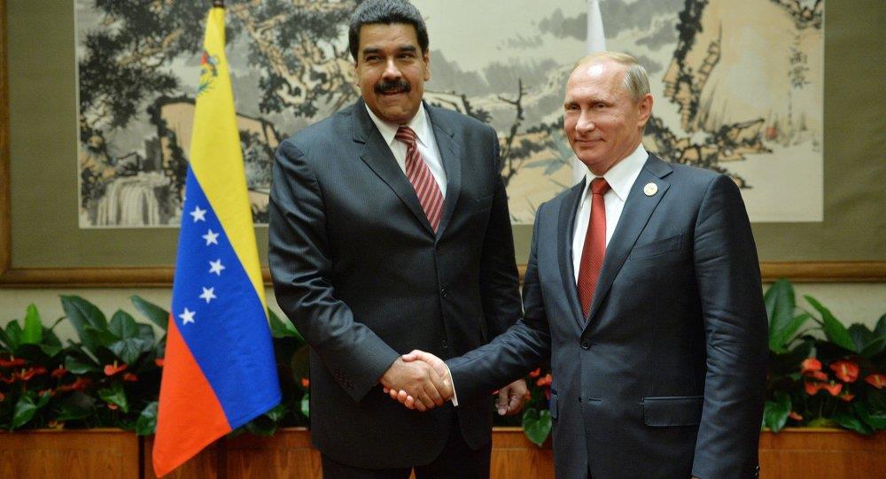 الرئيس الروسي فلاديمير بوتين و  نيكولاس مادورو رئي