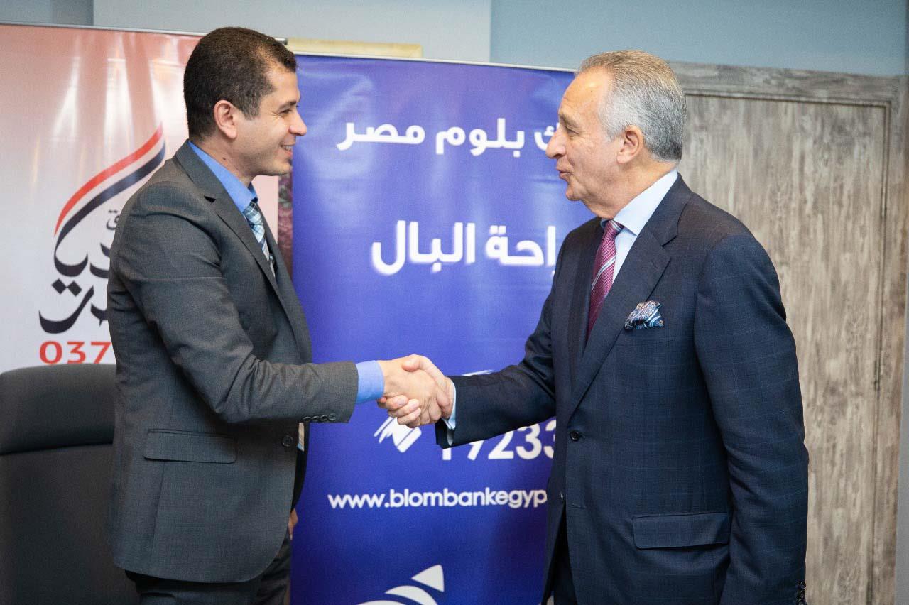 محمد أوزالب رئيس بنك بلوم بعد توقيع الاتفاقية مع ص