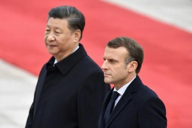 الرئيس الفرنسي إيمانويل ماكرون والرئيس الصيني شي ج