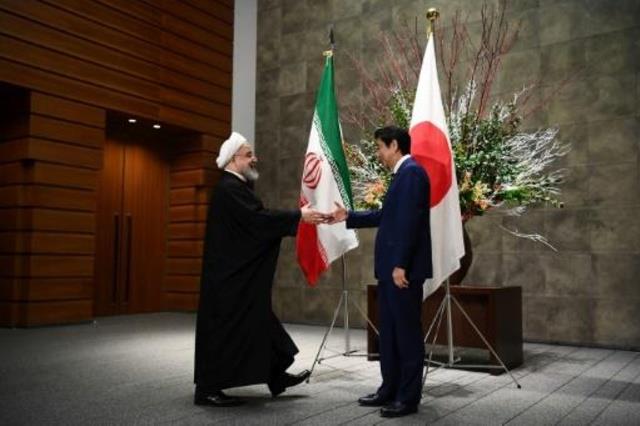 رئيس الوزراء الياباني شينزو آبي والرئيس الإيراني ح
