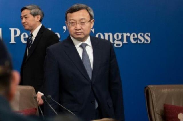 نائب وزير التجارة الصيني وانغ شوين خلال مؤتمر صحاف